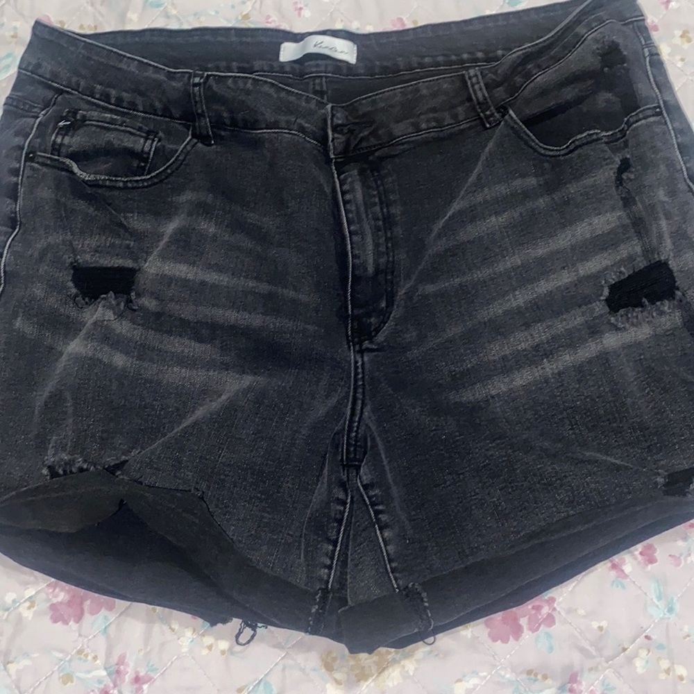 Faded distressed black shorts